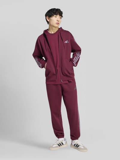 adidas Sportswear Regular Fit Kapuzenjacke aus Baumwoll-Mix mit 3-Streifen-Design Dunkelrot 1