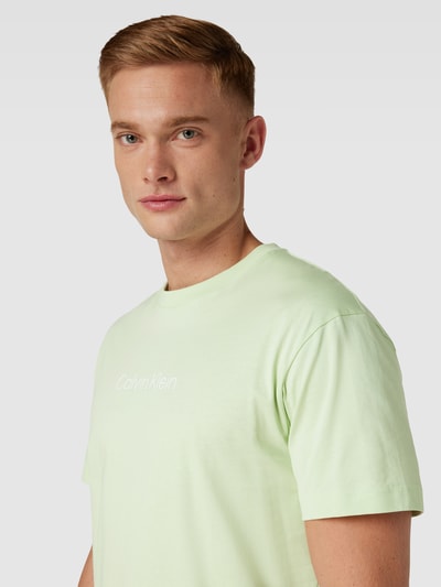 CK Calvin Klein T-shirt met labelprint, model 'HERO' Neon groen - 3