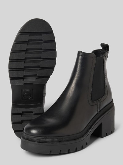 Produktfoto, schwarze Boots aus echtem Leder von Tamaris mit glatter Oberfläche, grober Profilsohle und robustem Absatz, Damen Stiefel / Boots von Tamaris.