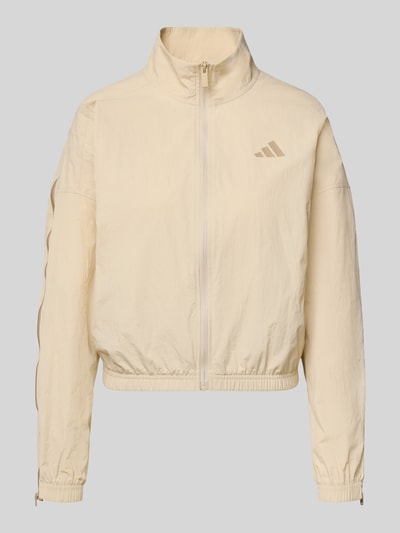 Productfoto, 'Jacke mit Stehkragen' van adidas Sportswear in beige, regular fit, rits, labelprint, elastische boorden, gladde textuur