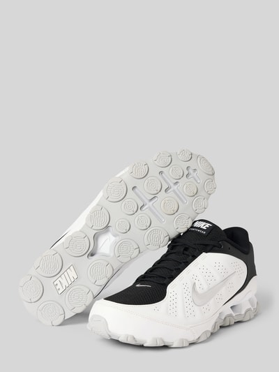 Produktfoto, Sneaker mit Logo-Detail Modell 'REAX 8 NSW SL' von Nike in Schwarz und Weiß, strukturierte Sohle, Herren Sneaker von Nike