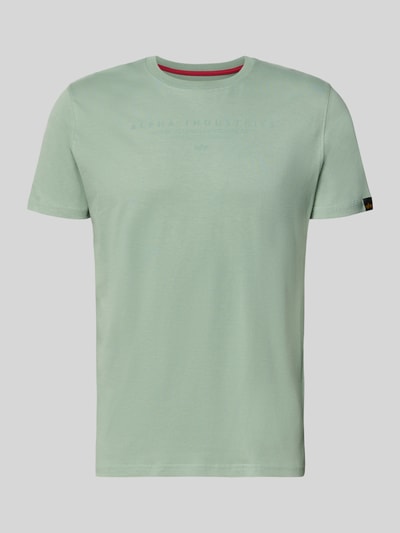 Produktfoto, T-Shirt mit Label-Print und Rundhalsausschnitt von Alpha Industries aus reiner Baumwolle in mintgrün, Regular Fit, glatte Textur.