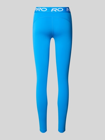 Produktfoto, Leggings mit elastischem Bund und Logo von NIKE TRAINING in Blau, Material-Mix mit Stretch-Anteil, körpernahe Passform