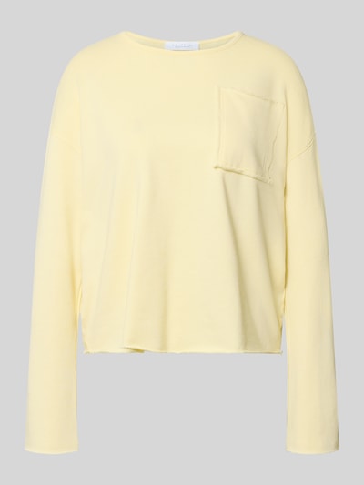 Produktfoto, Sweatshirt mit Brusttasche von Rich & Royal in hellem Gelb, aus reiner Bio-Baumwolle, lockerer Schnitt, strukturierter Stoff