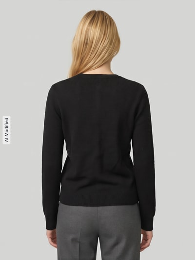 Vrouwenmodel draagt Regular fit gebreid jack met wol model 'MALOU' van PIECES in zwart, Dames, volledig zicht achterkant, KI-modified beeld