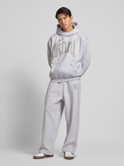 KARL KANI Wide Leg Sweatpants mit Label-Print Hellgrau Melange 1