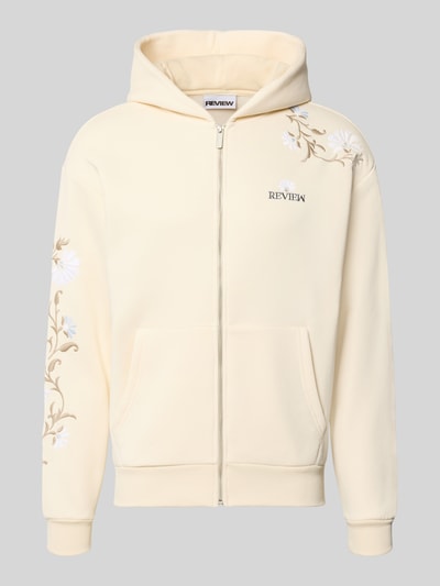 Produktfoto, Relaxed Fit Sweatjacke mit Kapuze von REVIEW in Beige, florale Stickerei, Kängurutasche, Reißverschluss, Baumwoll-Mix.