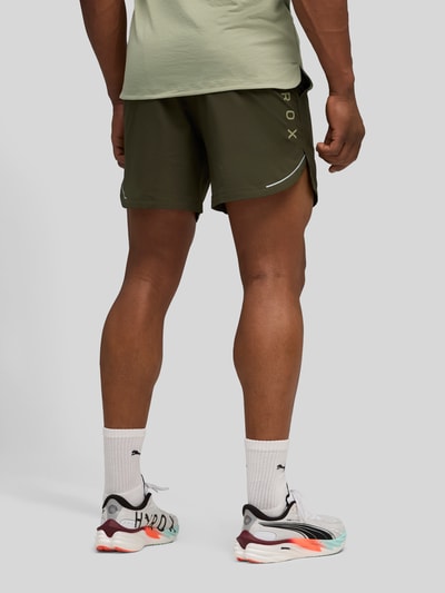 PUMA Performance PUMA x HYROX - Regular Fit sportshorts van ultralicht materiaal Olijfgroen - 4