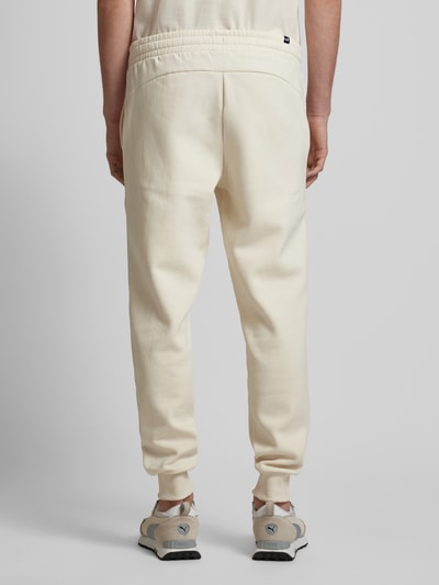 PUMA PERFORMANCE Relaxed Fit Sweatpants mit Label-Print Offwhite 5