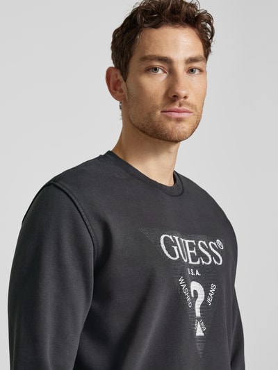 Guess Bluza z nadrukiem z logo model ‘TREATED’ Czarny 3