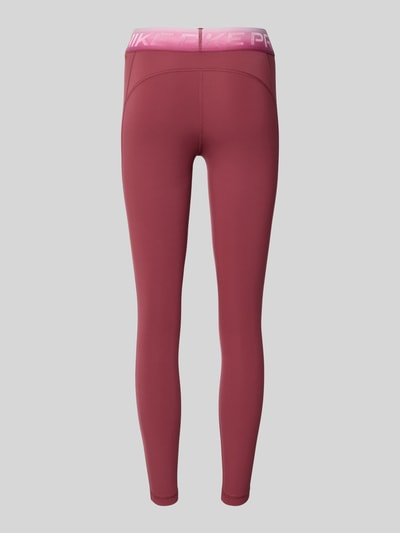Produktfoto, Slim Fit Sport-Leggings mit Logo-Print von Nike in Weinrot mit rosafarbenem Bund, Damen Sport-Leggings von Nike