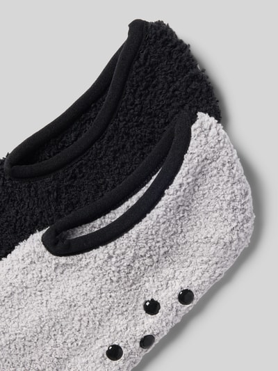 Produktfoto, Kuschelsocken mit Noppen von camano in Schwarz und Grau mit flauschiger Textur, elastische Bündchen, noppen, materiał z domieszką stretchu