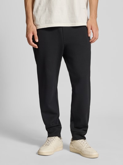 CHAMPION Spodnie dresowe z elastycznym pasem i tunelem Czarny 4