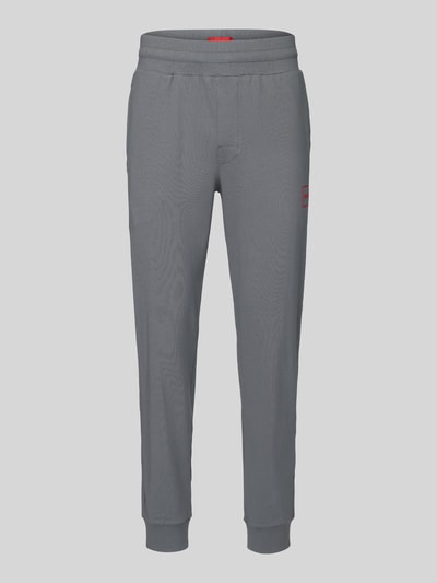 HUGO Spodnie dresowe w kroju regular fit z mieszanki bawełny model 'Laze Pants CW' Średnioszary 2