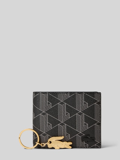 Produktfoto, Portemonnaie mit Allover-Muster Modell 'Noir Gris' von Lacoste, rechteckig, Kunstleder, Logo-Applikation, Logo-Anhänger, Farben: Schwarz, Grau, Gold, Optik:Allover-Muster, Aufteilung: Geldscheinfach, Münzfach, Kartenfächer.