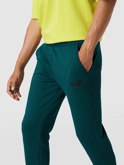 PUMA PERFORMANCE Sweatpants met logoprint, model 'ESS LOGO PANT' Flessengroen - 3