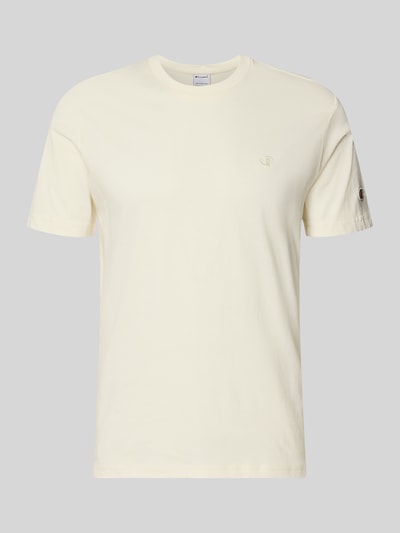 Produktfoto, T-Shirt mit Label-Stitchings und Rundhalsausschnitt von CHAMPION aus Reine Baumwolle, Regular-Fit, Farbe Creme. Rückenlänge bei Größe M: 66 cm.