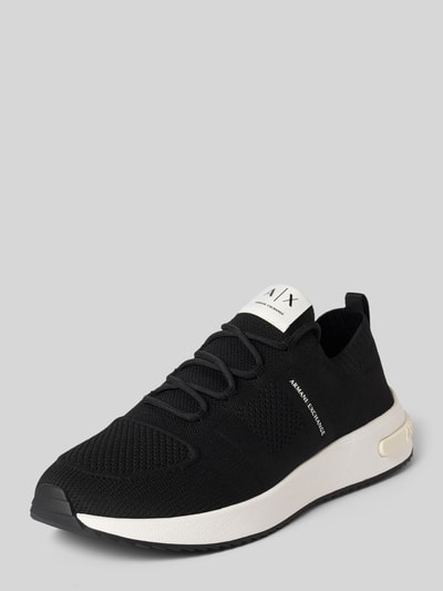 Produktfoto, Sneaker in Schlupfform Modell 'DUSSELDORF' von Armani Exchange in Schwarz mit abgerundeter Spitze, Label-Details, Absatzhöhe 3 cm, Schafthöhe 6 cm, Schaftweite 8 cm, weiße Sohle, strukturierte Oberfläche