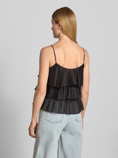 Frauenmodel trägt Regular Fit Top aus Lyocell-Mix von JAKE*S STUDIO WOMAN mit Rüschenbesatz und Spaghetti-Träger in Schwarz, Rückenlänge bei Größe 36: 35 cm, Ganzkörperansicht Rückansicht.