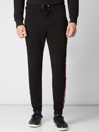 Alpha Industries Sweatbroek met logostrepen Zwart - 4