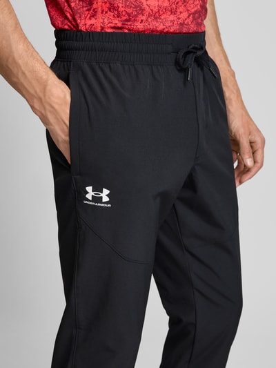 Under Armour Relaxed Fit Trainingshose mit Label-Print Modell 'Vibe' Black 3