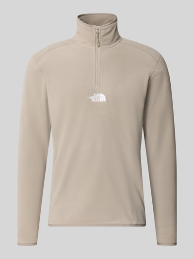 Productfoto, Fleecepullover met Label-Stitching van The North Face in beige, regular fit, opstaande kraag, ritssluiting, heren, ruglengte maat M 70 cm, mouwlengte 68 cm
