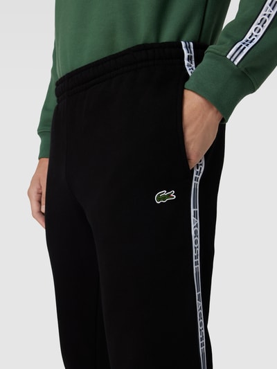 Lacoste Sweatpants mit Label-Streifen Modell 'TAPE' Black 3