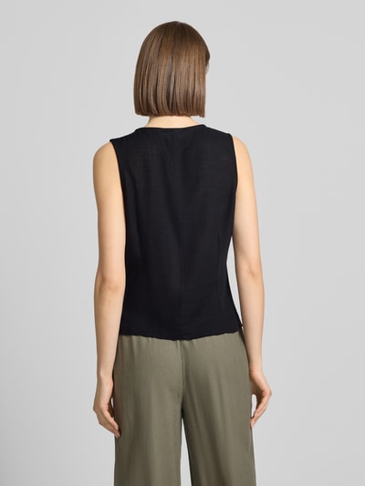 Frauenmodel trägt schwarze Weste aus Viskose-Leinen-Mix Modell 'LEILANI' von Noisy May, Damen Slim-Fit, Rückansicht, glatte Textur.
