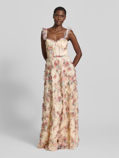 Modelka nosi długa sukienka Maxikleid mit Rüschen im Stufen-Look von Unique, linia a, wzór na całej powierzchni, falbany, efekt stopniowania, długość tyłu w rozmiarze 36: 137 cm, szerokość w rozmiarze 36: 35 cm, całkowity widok z przodu.