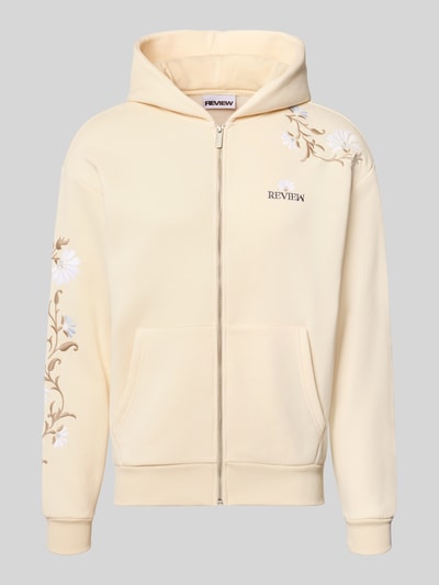 Produktfoto, Relaxed Fit Sweatjacke mit Kapuze von REVIEW in Creme mit floraler Stickerei, Kängurutasche und Reißverschluss, Baumwoll-Mix