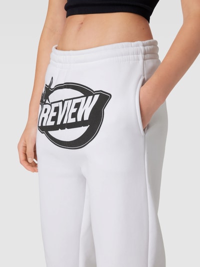 Review Spodnie dresowe z nadrukiem z logo Biały 3