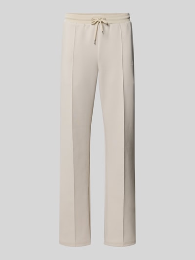 Produktfoto, Track Pants mit Eingrifftaschen Modell 'Ballier' von Les Deux, beżowy materiał z dodatkiem stretchu, prosty krój, elastyczny pas z troczkiem, francuskie kieszenie, długość wewnętrzna nogawki w rozmiarze M: 78 cm