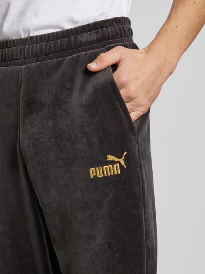 PUMA PERFORMANCE Relaxed Fit Sweatpants mit Label-Stitching Modell 'Velvettrack' Black 3