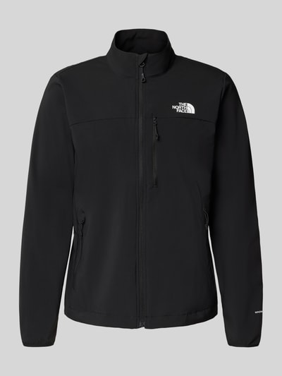 Produktfoto, czarna Jacke mit Stehkragen und Logo od The North Face, materiał ze stretchem, krój regular fit, zamek, logo, kieszenie na zamek, długość pleców w rozmiarze M 71 cm, szerokość ramion w rozmiarze M 46 cm, szerokość klatki piersiowej w rozmiarze M 56 cm, długość rękawa w rozmiarze M 58 cm