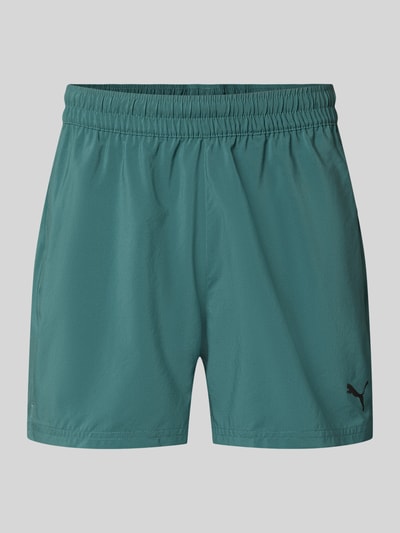 PUMA Performance Szorty sportowe o kroju regular fit z nadrukiem z logo model „TAD ESSENTIALS” Ciemnozielony 1