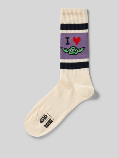 Produktfoto, cremefarbene Socken aus Baumwoll-Mix Modell 'I HEART GROGU' von Happy Socks mit Streifen, rotem Herz und Grogu-Motiv auf lila Grund, sichtbares Label-Detail.