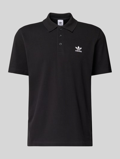 Produktfoto, schwarzes Regular Fit Poloshirt mit Logo-Stitching von adidas Originals, reine Baumwolle, Polokragen, glatte Textur