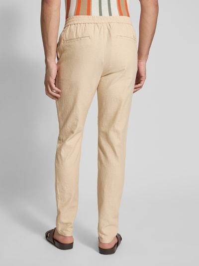 Scotch & Soda Spodnie materiałowe o kroju tapered fit z tunelem model ‘Warren’ Beżowy 5