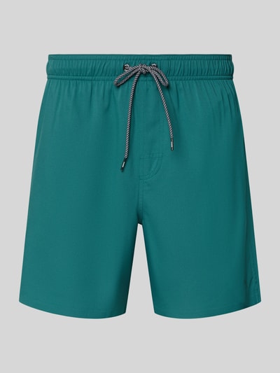 Produktfoto, Badeshorts mit zijzakken en ritszak achter van PUMA, heren zwembroek regular fit met elastische band, effen groen, gladde stof