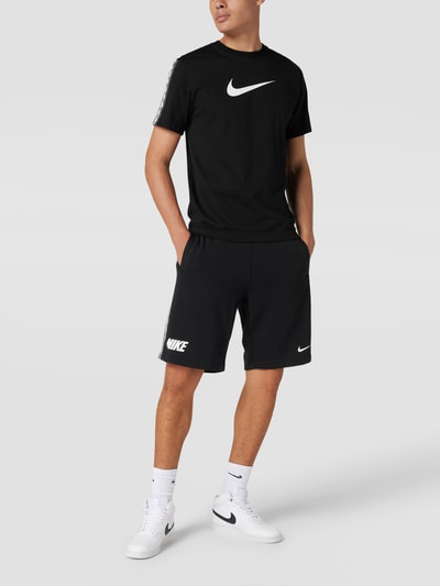 Nike T-shirt met galonstrepen, model 'REPEAT' Zwart - 1