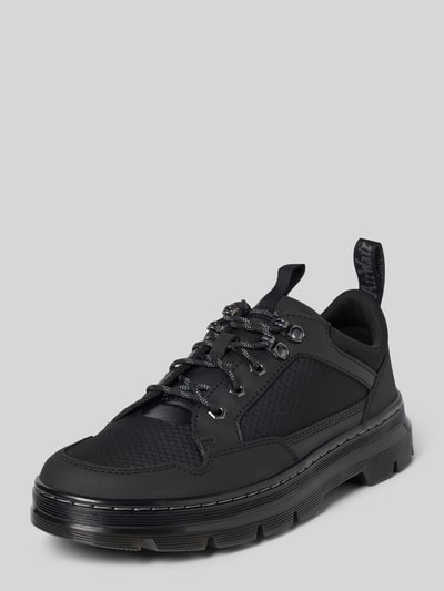 Produktfoto, sneakersy z mieszanki skóry model 'Reeder' od Dr. Martens, czarny, detal z logo, profilowana podeszwa, mieszanka skóry, wysokość obcasa 4 cm, wysokość cholewki 7 cm, szerokość w rozmiarze 44: 8 cm