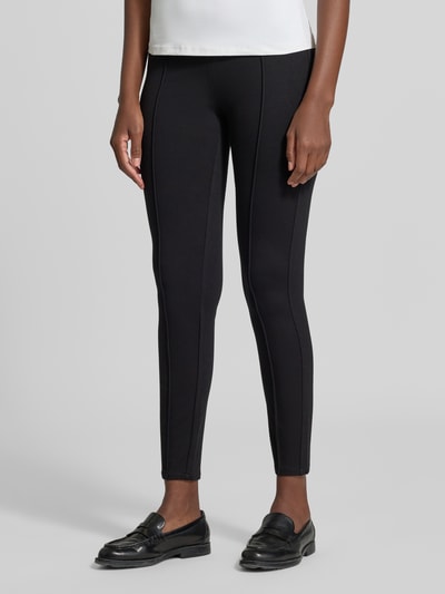 Vrouwenmodel draagt zwarte skinny legging van viscosemix, gladde textuur met verticale naden, Skinny Fit Leggings aus Viskose-Mix van Jake*s Casual, detailopname, Dames