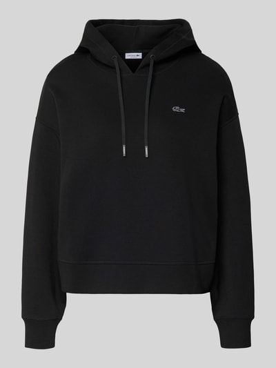 Produktfoto, Oversized Hoodie aus Baumwoll-Mix von Lacoste Sport in Schwarz, unifarben, Logo-Detail, Kapuze mit Tunnelzug, langarm, Sweat-Textur
