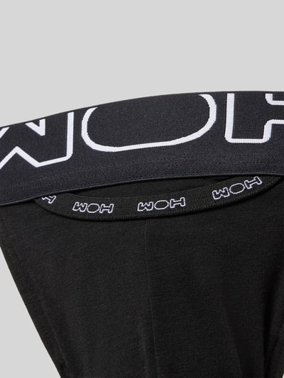 Produktfoto, schwarzer Slim Fit Jockstrap mit Logo-Stitching Modell 'Fun' von WOH, elastischer Baumwoll-Mix, weiße Schrift auf Bund.