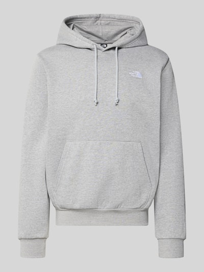 Produktfoto, Hoodie aus Baumwoll-Mix Modell 'EVOLUTION' von The North Face, luźny krój, kieszeń kangurka, kaptur z tunelem, elastyczne wykończenia, mieszanka bawełny, szary kolor, tekstura gładka