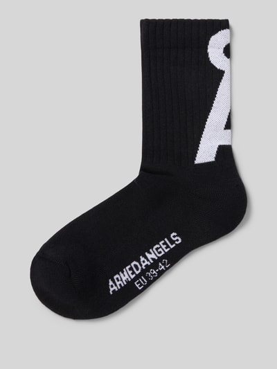 Produktfoto, Socken mit Label-Stitching 'SAAMUS' von armedangels, jednokolorowy, detal z logo, prążkowany ściągacz, mieszanka bawełny