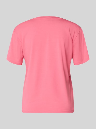 Frauenmodel trägt Regular Fit Pyjama-Oberteil aus Modal-Mix von HUGO in Optik: Unifarben, Jersey-Struktur, Kurzarm, Ganzkörperansicht Rückansicht.