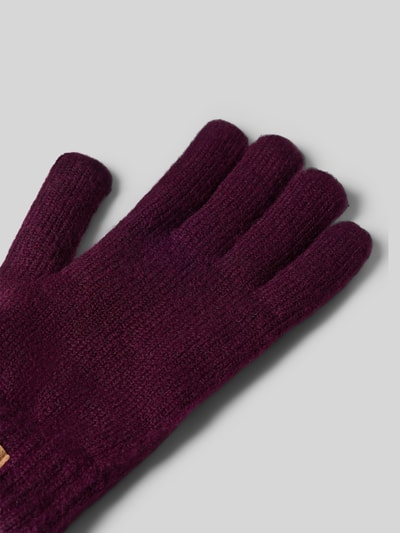 Produktfoto, dunkel-violette Handschuhe mit grober Textur und Label-Patch Modell 'Witzia' von Barts, Damen Handschuhe von Barts