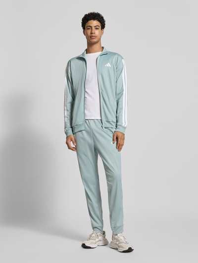 adidas Sportswear Spodnie dresowe w kroju slim fit z haftowanym logo Miętowy 1