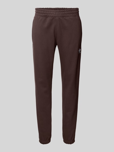 Produktfoto, Sweatpants mit elastischem Bund van adidas Originals voor heren van katoenmix, los model, steekzakken, labelstitching, binnenbeenlengte bij maat M 77 cm, bruin